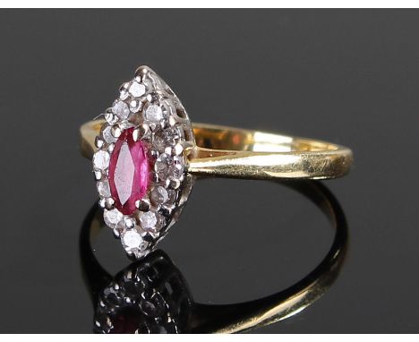 18 carat gold diamond and ruby ring, the naivete shape head with central ruby, surrounded with diamonds, ring size F