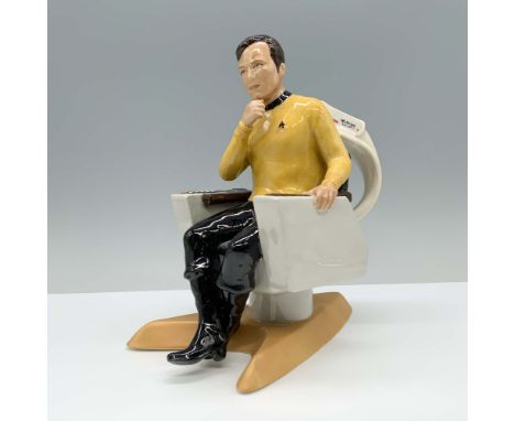 Hand painted porcelain of Star Trek character Captain Kirk on iconic yellow an black uniform and spaceship themed chair that 