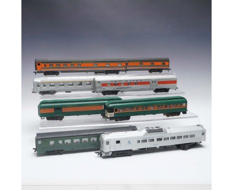 Comprising 77 total pieces, this HO scale model train and building collection includes a wide assortment of rolling stock, pa