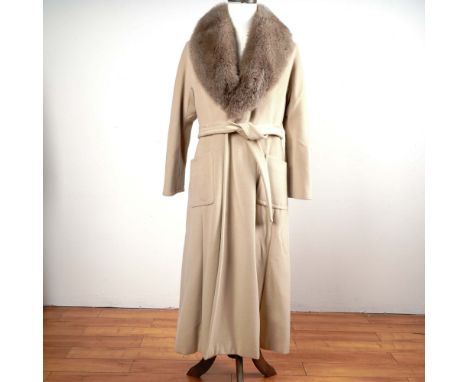 Elegant and impeccably tailored wrap coat by Max Mara (Italy), crafted from a sumptuous wool-cashmere blend. This timeless Si