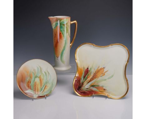 Three-piece hand painted porcelain grouping featuring a vibrant corn motif design. The set includes a square tray with scallo