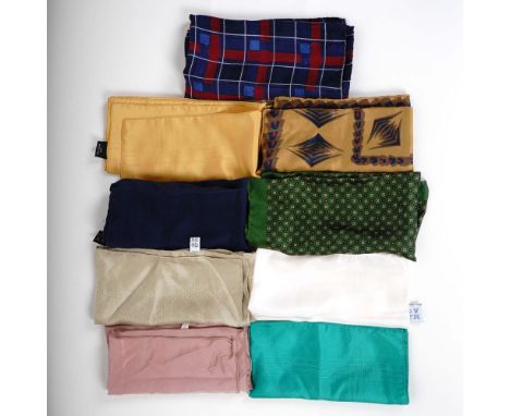 Chic collection of nine luxurious 100% silk scarves, each measuring approximately 16" x 16". This vibrant assortment features