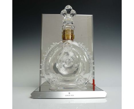 This exquisite Louis XIII decanter by Remy Martin is crafted from fine Baccarat crystal and showcases the iconic fleur-de-lis