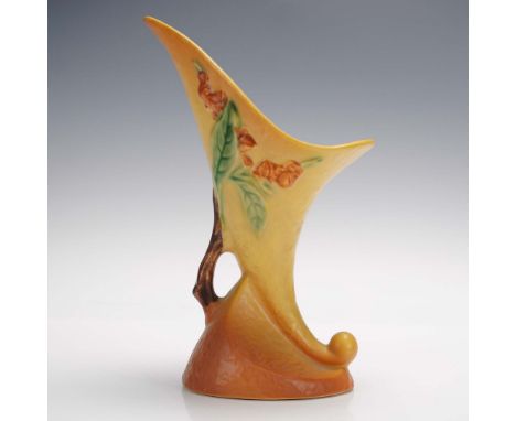 This striking Roseville Pottery vase features the Bittersweet pattern, introduced in 1951, and is modeled in the elegant corn