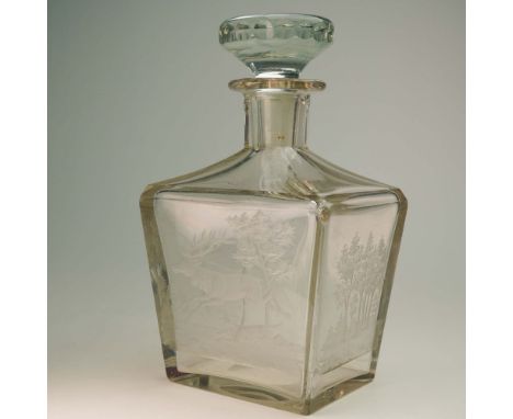 A stunning vintage bottle featuring intricate deep cut designs, crafted by the esteemed Moser glassworks in Karlsbad around 1