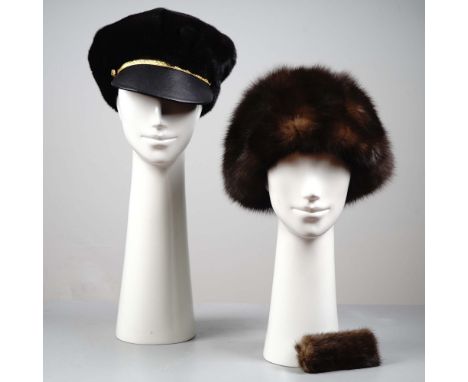 Set of two vintage women's fur hats and a matching handle cover, all attributed to Lenore Marshall of New York. Includes:  A 