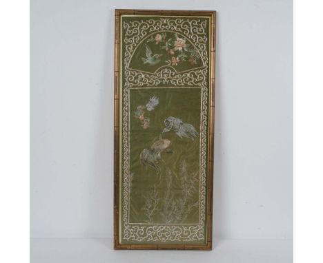 A beautifully crafted silk embroidery features an intricate design of goldfish, aquatic plants, a bird, and floral motifs. Th