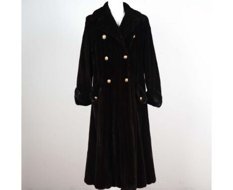 Luxurious full-length women's fur coat by Ben Kahn, renowned American furrier celebrated for exceptional quality and craftsma