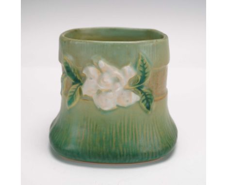 A vintage Roseville Pottery vase in the "Gardenia" pattern, dating to the 1940s. This piece features a gently flared, rounded