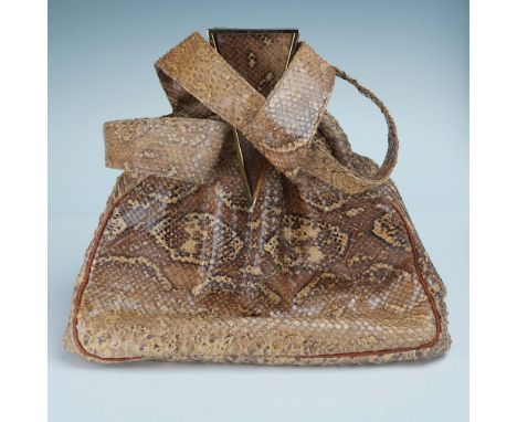 Vintage handbag crafted from genuine snakeskin with a warm, natural tan and brown scale pattern, featuring a bold geometric g
