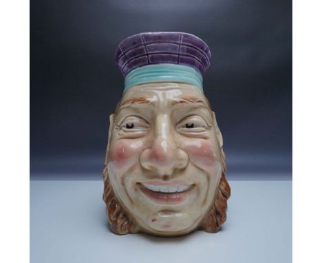 Charming Sarreguemines Majolica character jug titled Matelot, depicting a jolly sailor with a beaming smile. This finely craf
