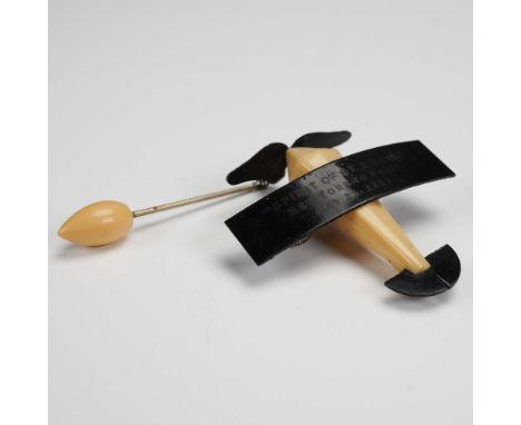 Vintage novelty hat pin designed in the shape of the Spirit of St. Louis monoplane, commemorating Charles Lindbergh's histori