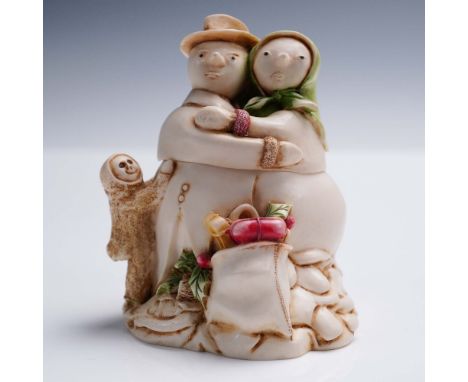This Harmony Kingdom jewelry box titled Snowdonia Fields is a whimsical collectible featuring a snowman couple sharing a lovi
