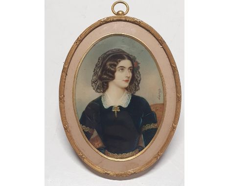 A gilt framed oval miniature portrait depicting a beautiful Georgian Lady. Signed Leroy. 11cm x 9cm.