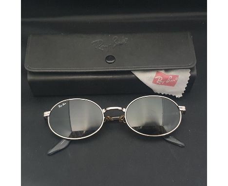 A pair of cased vintage Ray Ban sungasses.