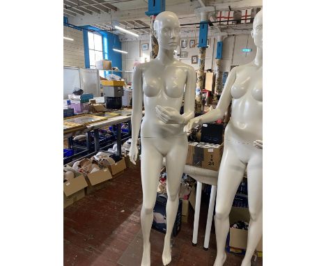 A female mannequin on stand, shipping unavailable