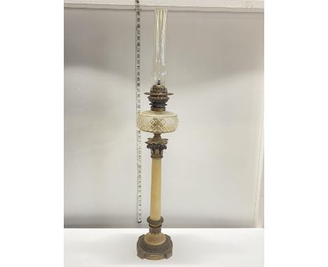 A large Victorian brass and alabaster oil lamp base with glass reservoir and chimney, overall height 97cm, shipping unavailab
