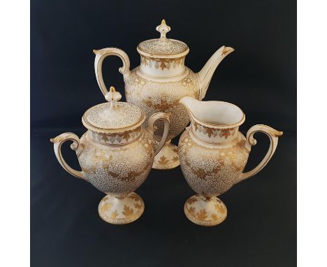 A early 19th century finely decorated tea service with hand applied gold gilt decoration