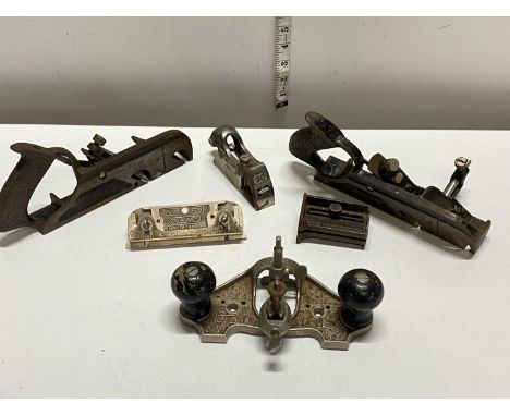 A selection of vintage Stanley wood working planes including a Stanley 90