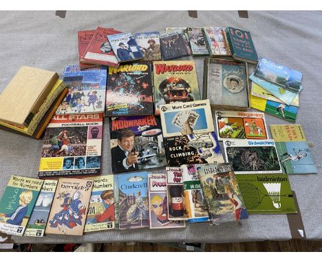 A job lot of vintage lady bird books and other annuals, shipping unavailable
