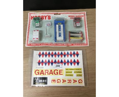 1 PACK OF VINTAGE MADEL GARAGE EQUIPMENT & STICKERS