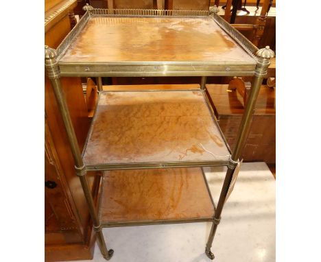 A French tubular lacquered brass and birds-eye maple inset three-tier square occasional table, on roller castors, w.37cm; tog