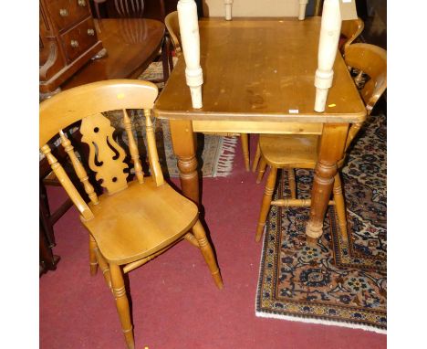A modern pine round cornered farmhouse compact kitchen table, length 121cm; together with a set of four beech splatback kitch
