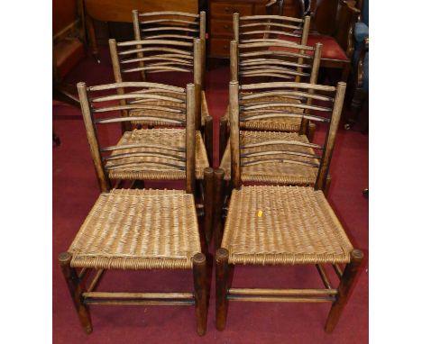 A set of six circa 1900 provincial stained elm railed ladder back rush seat dining chairs