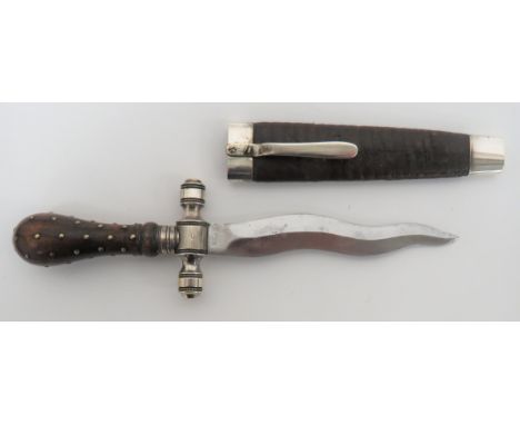 Late 19th Century Wavy Blade English Knife 5 1/4 inch, double edged, wavy blade. &nbsp;The forte to both sides stamped with c