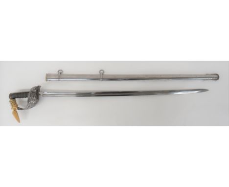 Victorian Heavy Cavalry Officer's Sword by Wilkinson 1879 34 3/4 inch, single edged, slightly curved blade with wide fuller. 