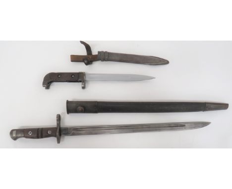 British P13 Bayonet and AK47 Contract Bayonet P13 bayonet with 16 1/2 inch, single edged blade with fuller. &nbsp;The forte s