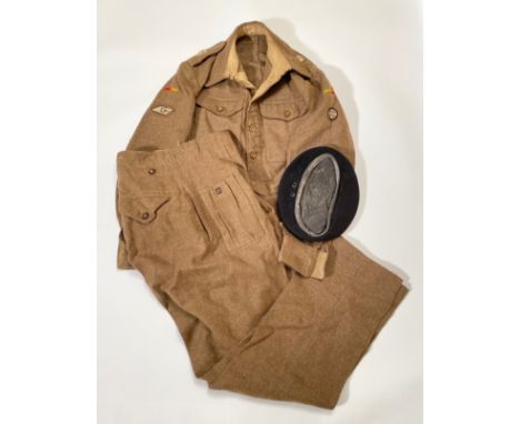 WW2 Armoured Corps Officers Battledress Uniform.  A good matching set as worn by Major J.M. Lester. Comprising: 1940 Pattern 