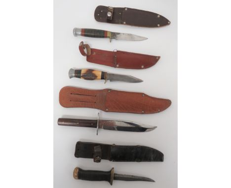 Four Various Hunting Knives consisting late 20th century Bowie knife with wooden slab grip. &nbsp;Contained in its leatherett