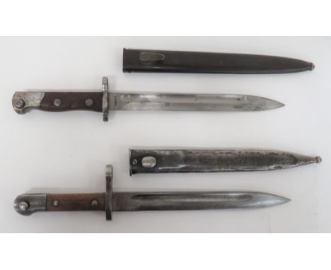 Two Mauser Contract Bayonets consisting Siamese contract example. &nbsp;9 3/4 inch, single edged blade with fuller. &nbsp;The