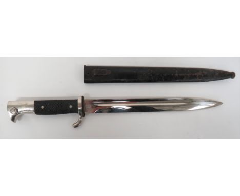 German K98 Dress Bayonet 9 3/4 inch, single edged, plated blade with fuller. &nbsp;The forte with "W.KC" maker's stamp. &nbsp