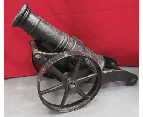 Early 20th Century Decorative Garden/Signal Cannon 24 inch, cast iron barrel with ring decoration. &nbsp;Cast iron slab side 