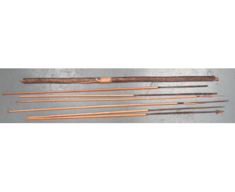 South American Bow and Arrows 51 inch, polished flattened, wooden bow complete with cord bow string. &nbsp;Together with six,