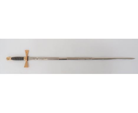 Wilkinson Post 1953 Welsh Presentation Sword 29 3/4 inch, double edged, plated blade. &nbsp;One side with etched leek, daffod