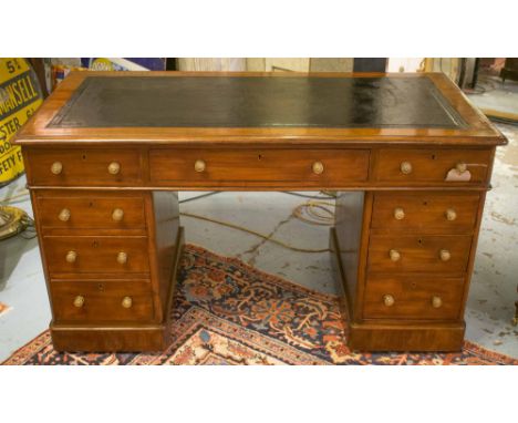 PEDESTAL DESK, Victorian mahogany with nine drawers, twin pedestals and tooled black leather top, 137cm x 69cm x 76cm H. 