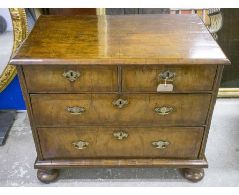CHEST, early 18th century, English Queen Anne, walnut, of small proportions, with two short and two long drawers on bun feet,