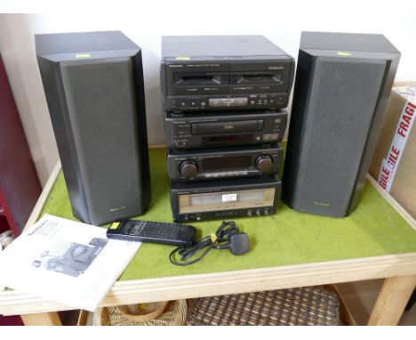 Technics stacking CD, stereo cassette, tuner, amplifier system, models SC-CA1080 and SC-CA1060 with cables, instructions and 