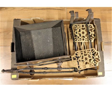 Metal fire grate, two brass hanging trivets and fireside accessories