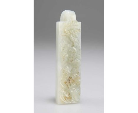 A JADE FEATHER PLUME HOLDER with tree and bird carving to the front. 8cm high