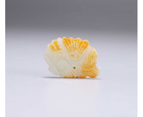 A CHINESE CARVED JADE PENDANT 4.5cm wideIn very good condition without damage.