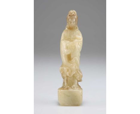 A CARVED JADE FEMALE FIGURE holding a ruyi sceptre, on a square base. 12.1cm high