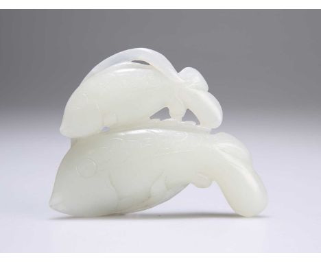 A CHINESE CARVED JADE GROUP depicting two carp. 8.5cm wideIn good condition.