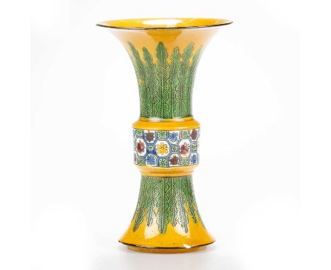 A CHINESE PORCELAIN YELLOW-GROUND GU VASE with incised green leaves, the waist with a polychrome panel, Qing dynasty. 21.5cm 