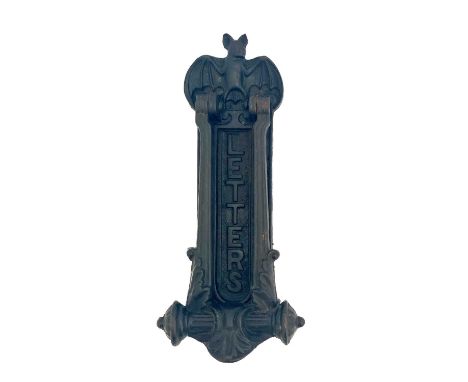 Kenrick and Sons., a Gothic Revival cast iron letter flat door knocker, surmounted by a bat with outstretched wings, Celtic k