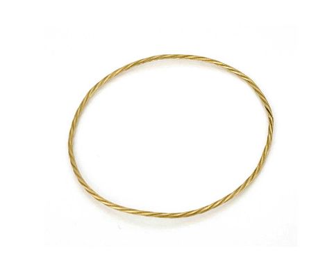 A Yellow metal bangle bracelet, twisted wire form, 7cm diameter, 4.4g