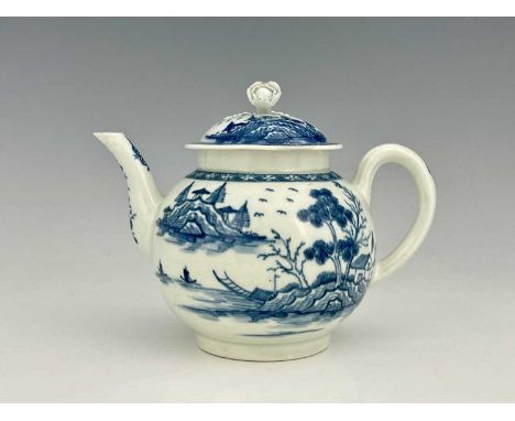 A Worcester blue and white teapot and cover, open crescent mark, circa 1770, bullet form painted decorated in the Rock Strata